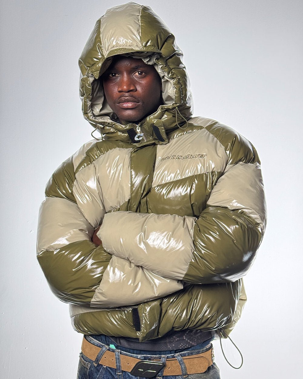 SPIRAL PUFFER GLOSSY GREEN MIX - green striped puffer jacket, front view on male model - Cold Culture #man