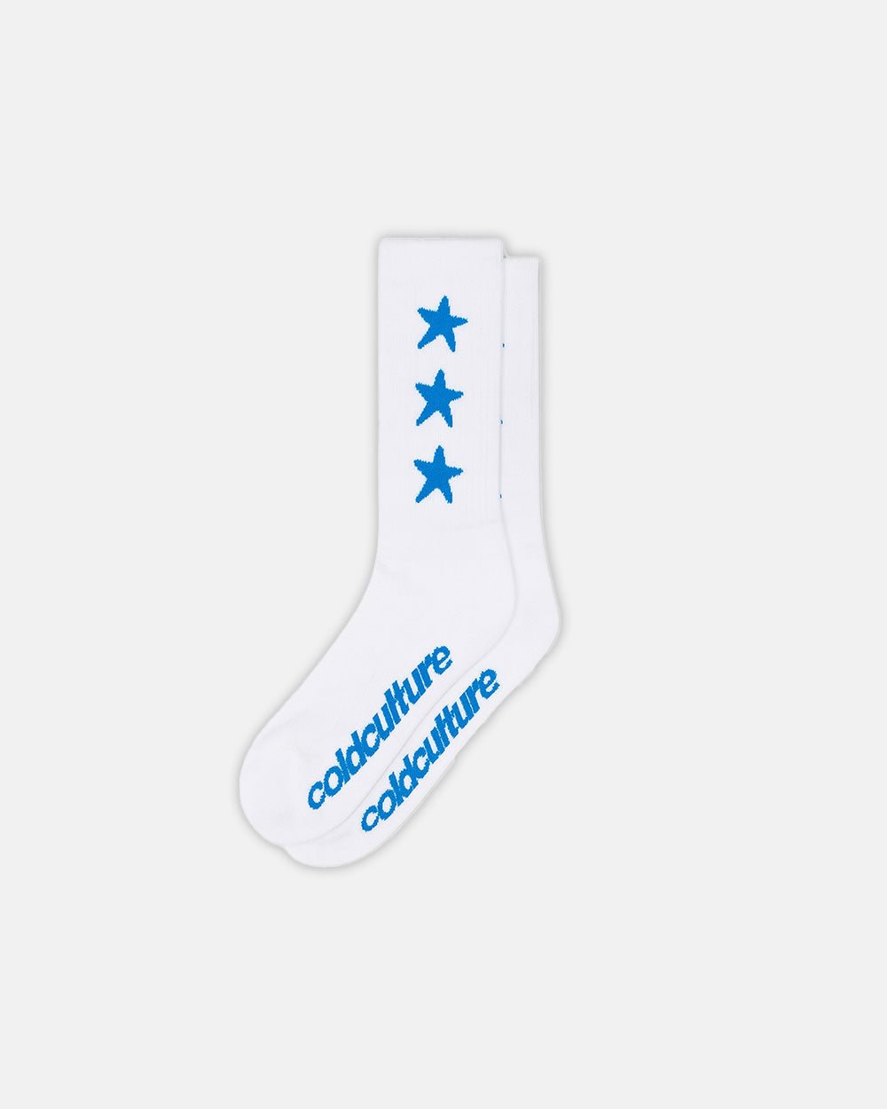 STARRY SOCKS BLUE/WHITE - white star print crew socks, flat lay - Cold Culture #packshot