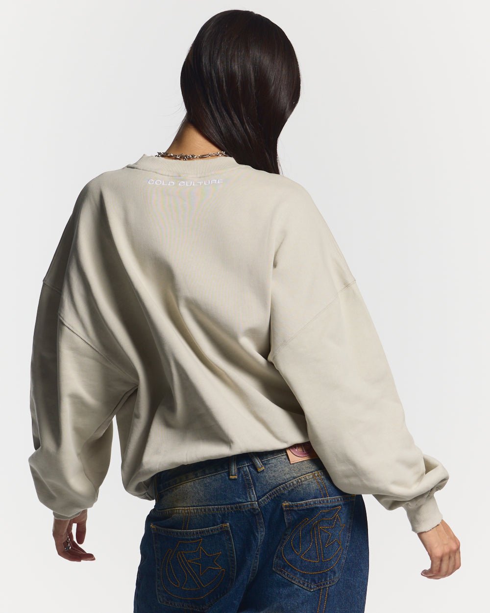 STARS CREWNECK PALE GREY - pale grey oversized crewneck sweatshirt, back view on female model - Cold Culture #woman