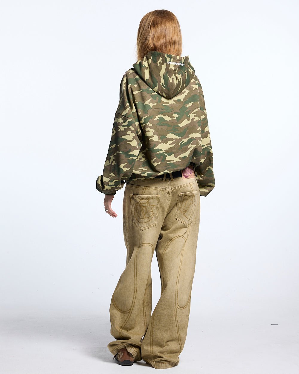 STARS HOODIE CAMO - camo hoodie with star print, back view on female model - Cold Culture #woman