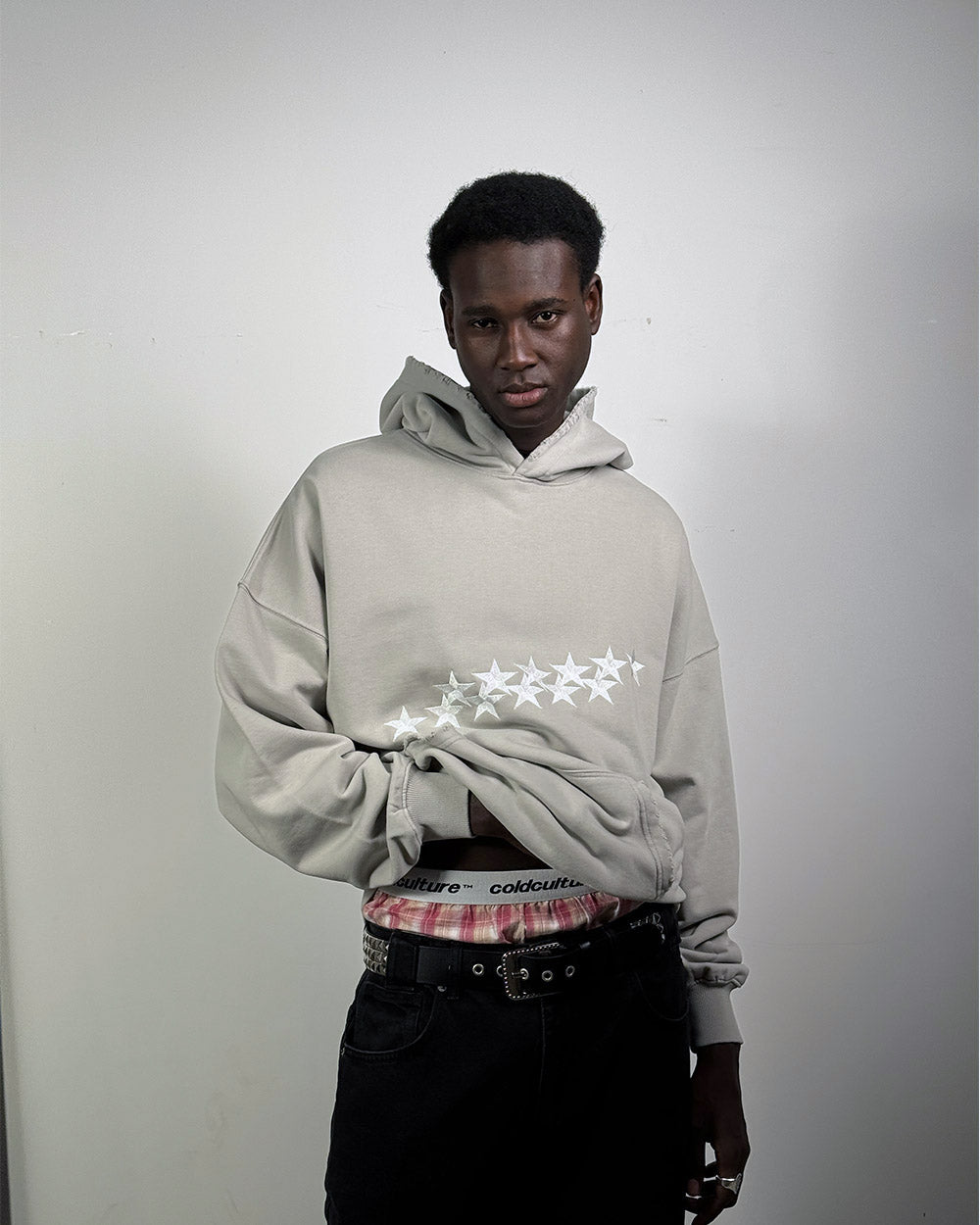 STARS HOODIE PALE GREY - pale grey star print hoodie, front view on male model - Cold Culture #man