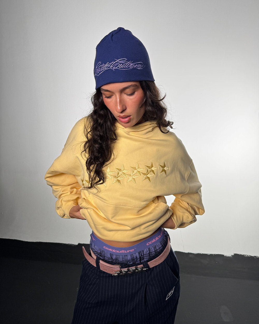 STARS HOODIE YELLOW - light yellow embroidered hoodie, front view on female model - Cold Culture #woman