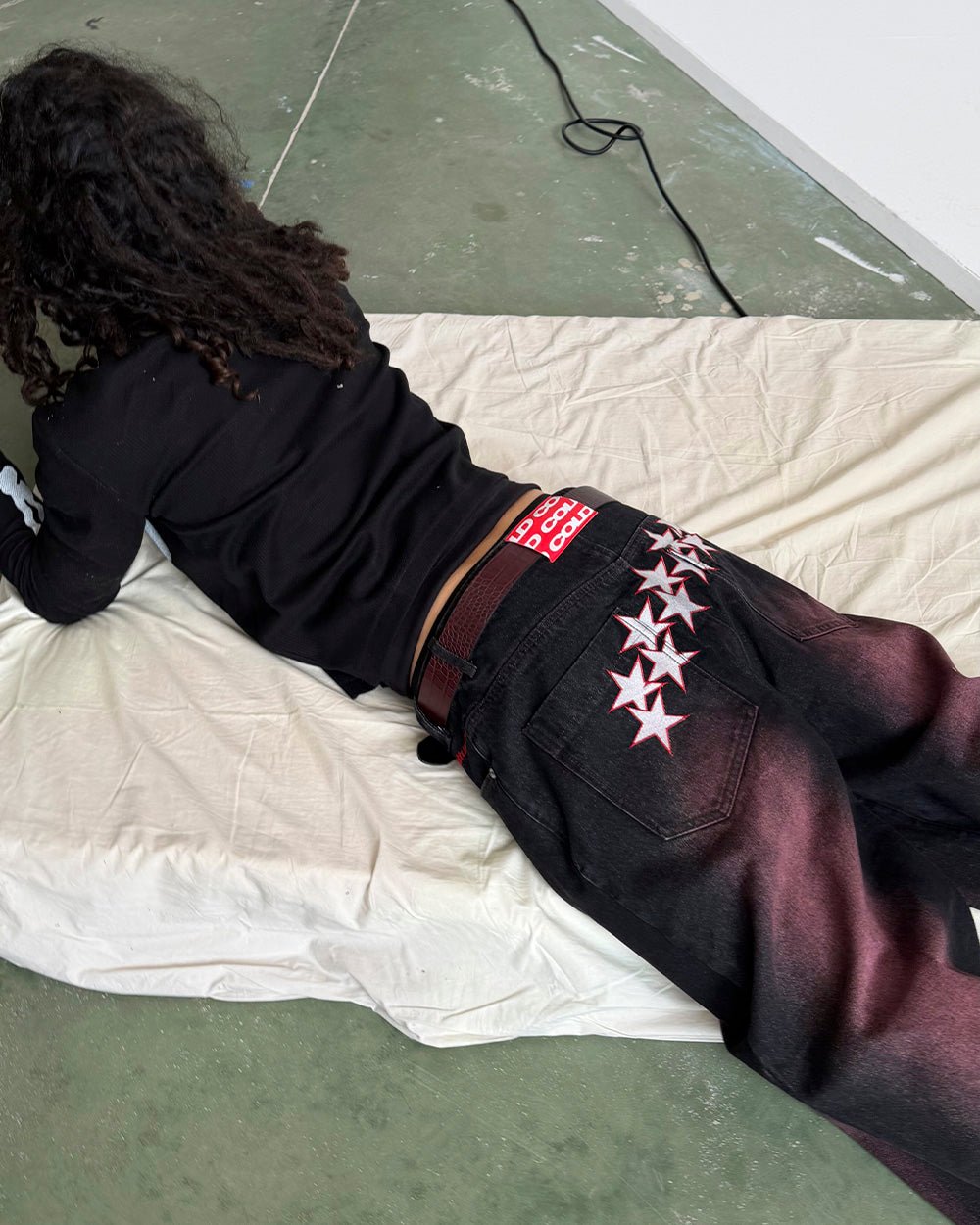 STARS V2 PANTS BURGUNDY - burgundy star embroidered pants, street style shot - Cold Culture