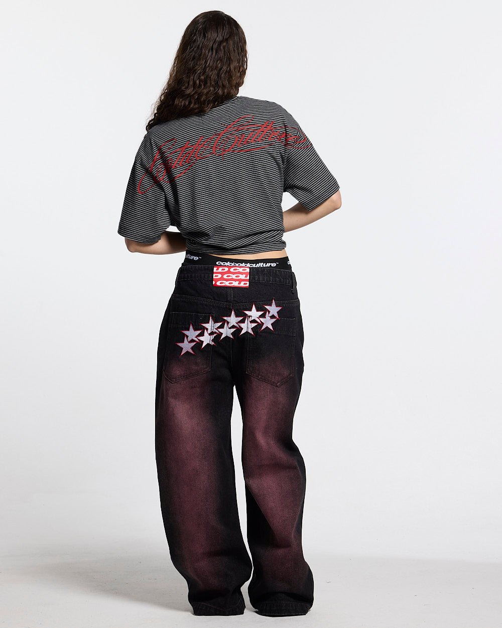 STARS V2 PANTS BURGUNDY - burgundy star embroidered pants, back view on female model - Cold Culture #woman