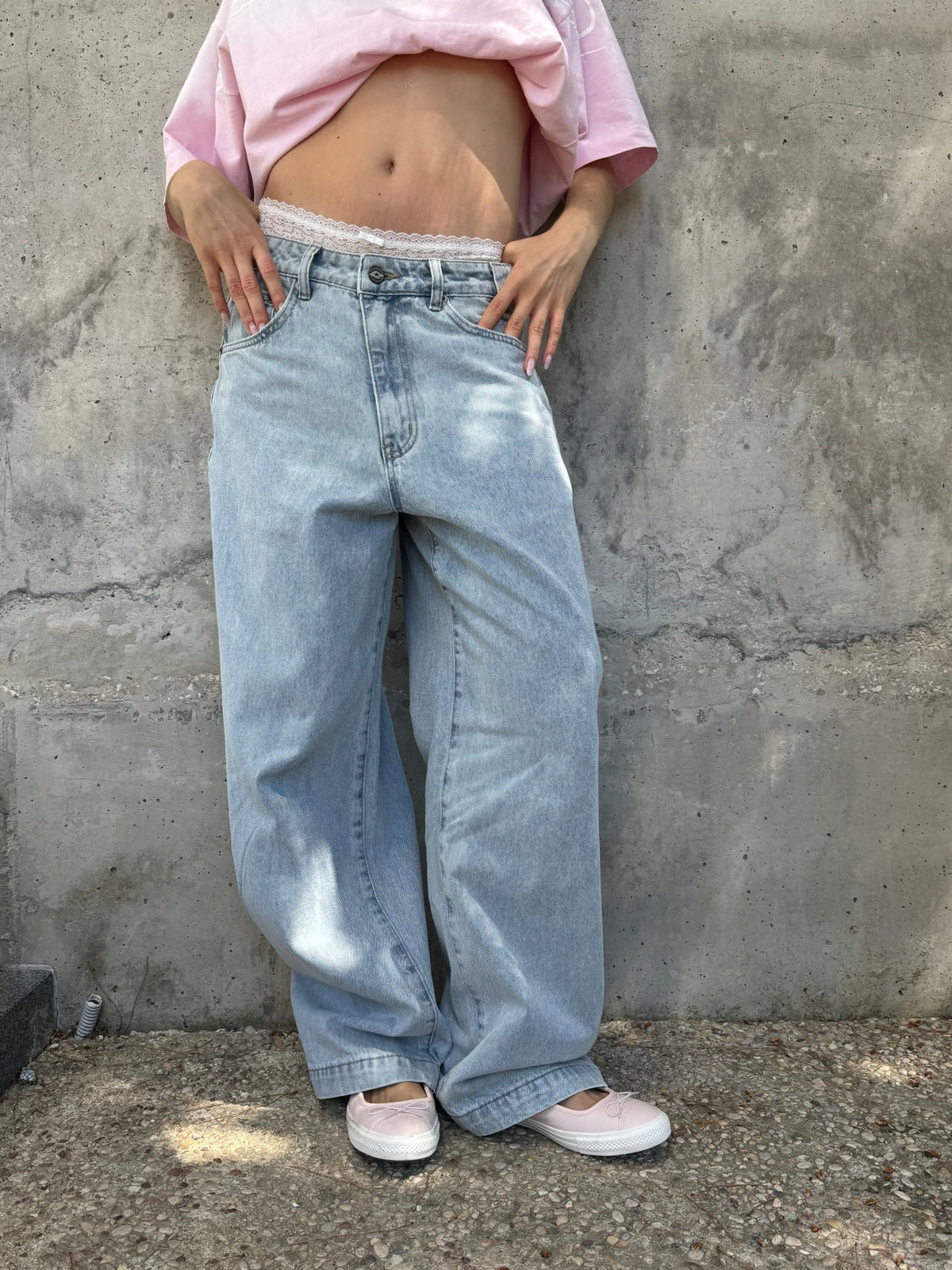 STARS V2 PANTS LIGHT BLUE DENIM - light blue baggy denim pants, front view on female model - Cold Culture #woman