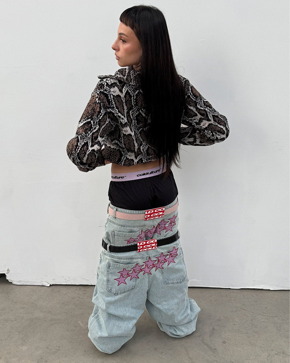STARS V2 PANTS LIGHT BLUE DENIM - light blue baggy denim pants, front view on female model - Cold Culture #woman