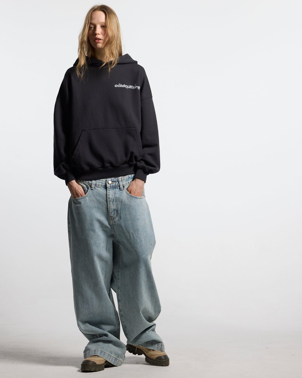 STARS V2 PANTS LIGHT BLUE DENIM - light blue baggy denim pants, front view on female model - Cold Culture #woman