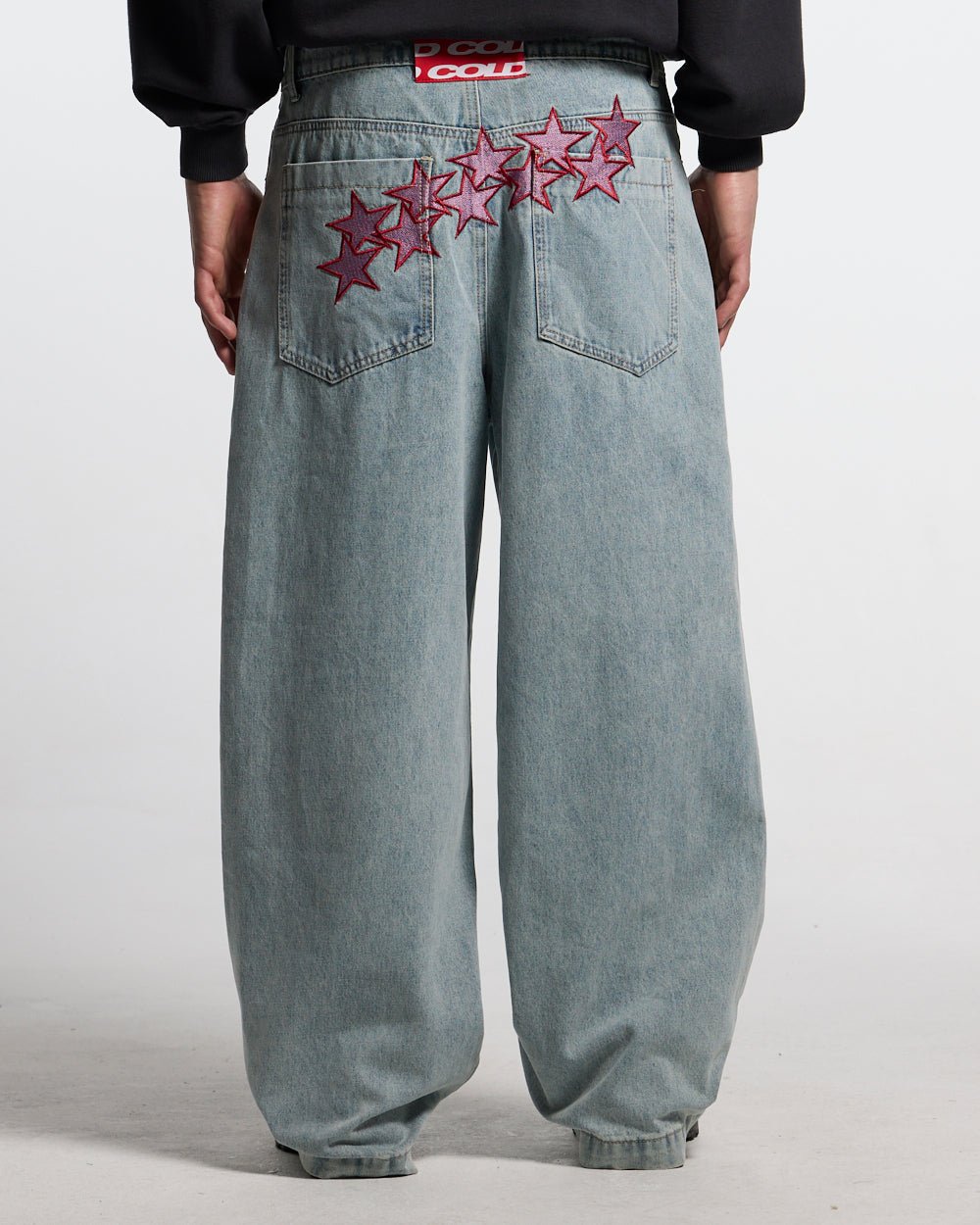 STARS V2 PANTS LIGHT BLUE DENIM - light blue baggy denim pants, back view on male model - Cold Culture