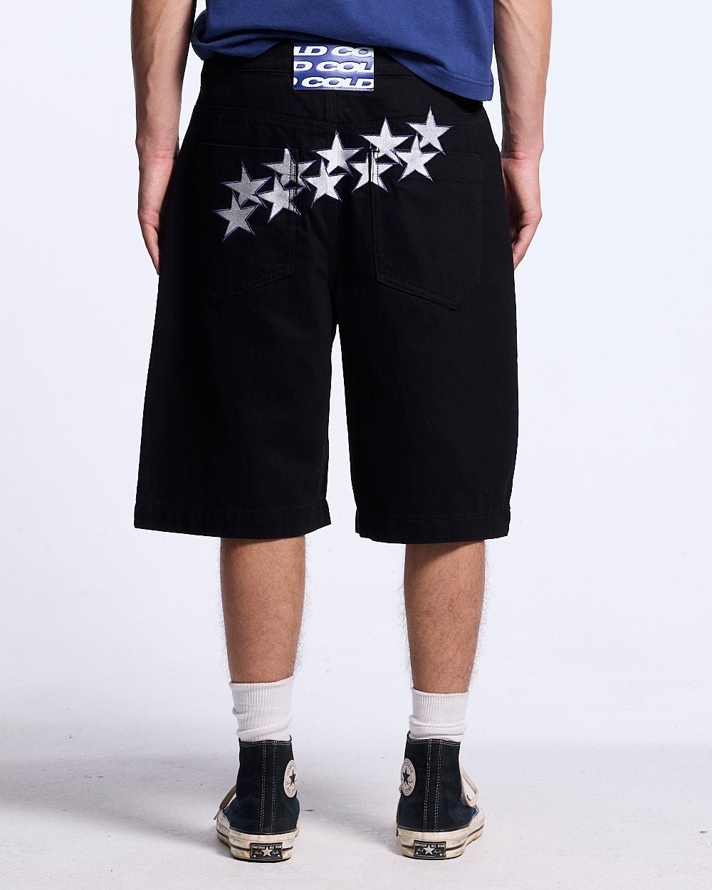 STARS V2 SHORTS BLACK - black baggy denim shorts, back view on male model - Cold Culture