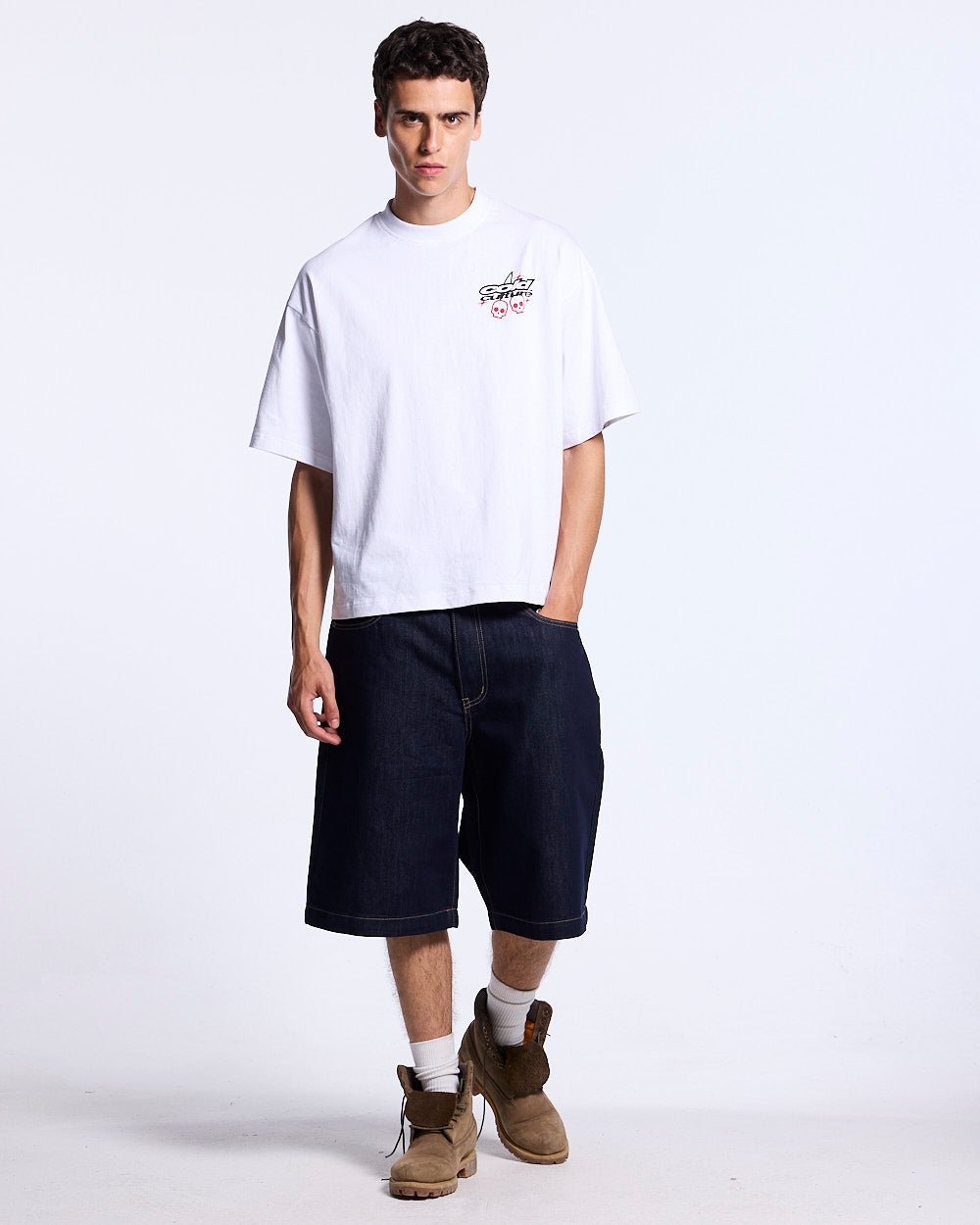 STARS V2 SHORTS RAW DENIM - baggy raw denim shorts, front view on male model - Cold Culture #man