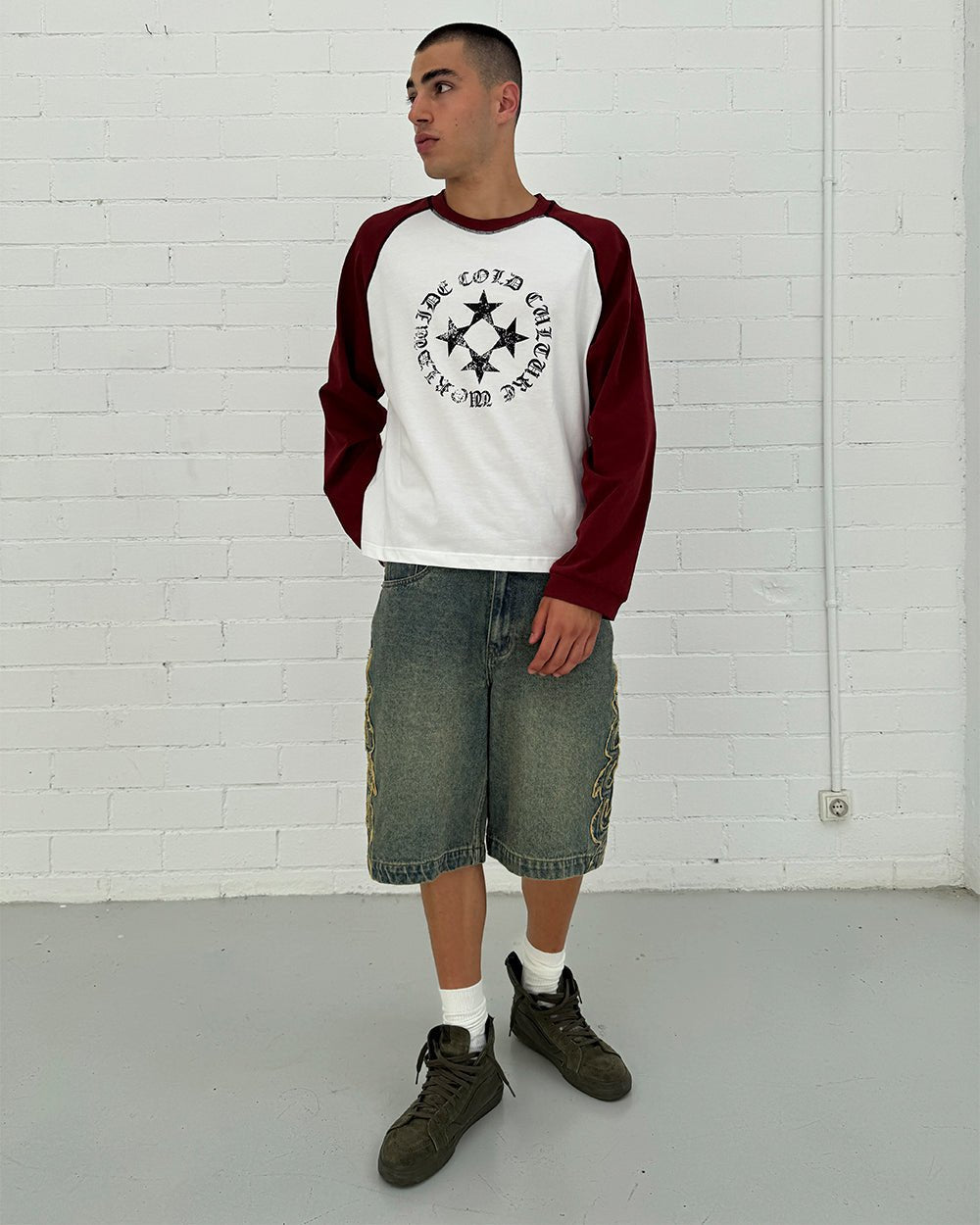 STARSHIELD LONGSLEEVE RED - white and red raglan longsleeve tee, front view on male model - Cold Culture