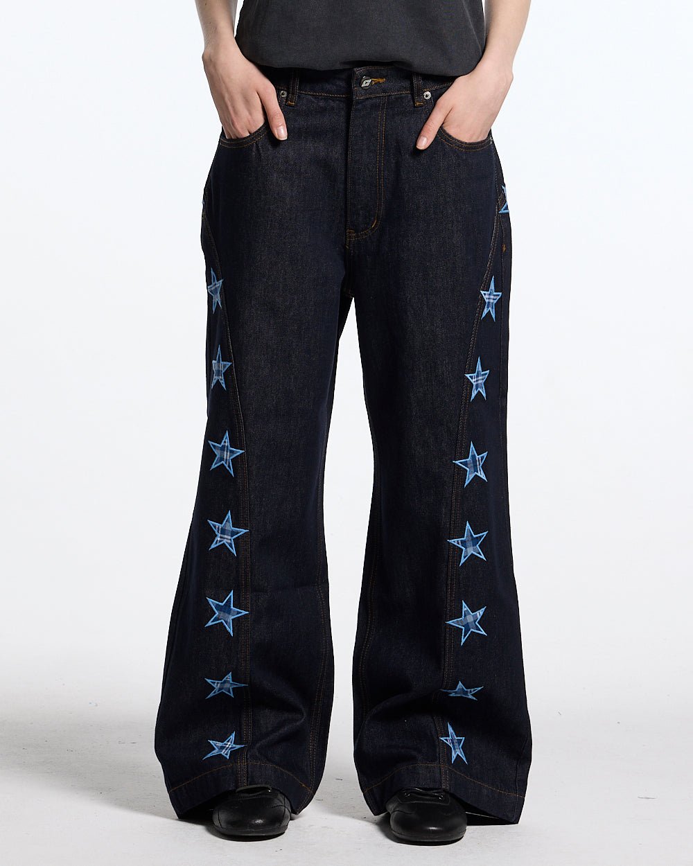 STARSHIP V3 PANTS RAW DENIM - raw denim pants with star print, front view on female model - Cold Culture #woman