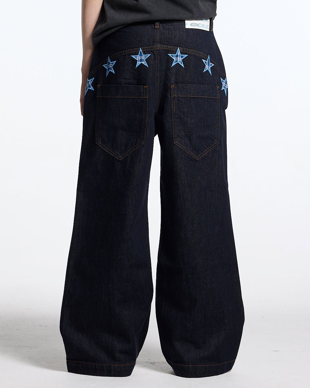 STARSHIP V3 PANTS RAW DENIM - raw denim pants with star print, back view on female model - Cold Culture #woman