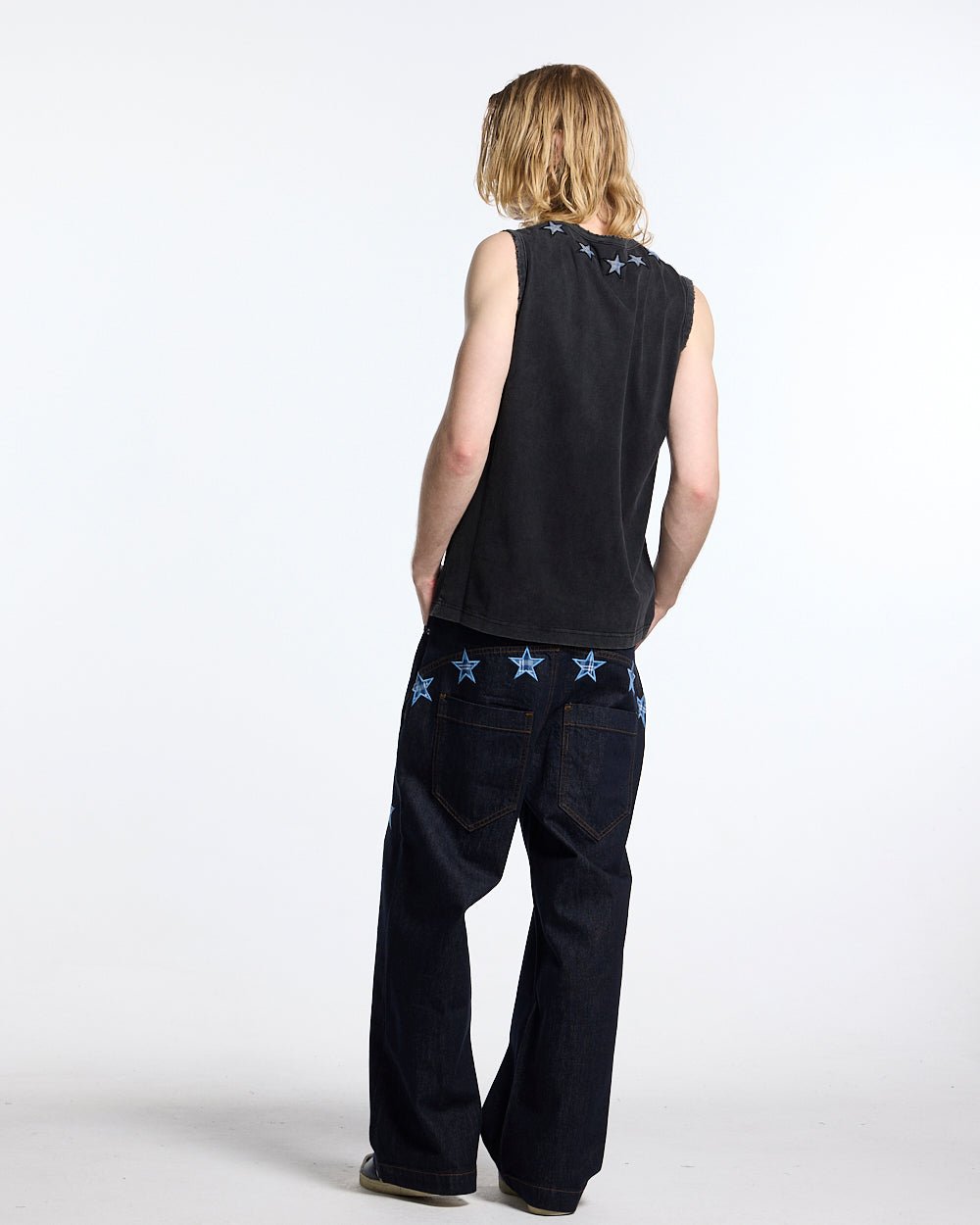 STARSHIP V3 PANTS RAW DENIM - raw denim pants with star print, back view on male model - Cold Culture #man