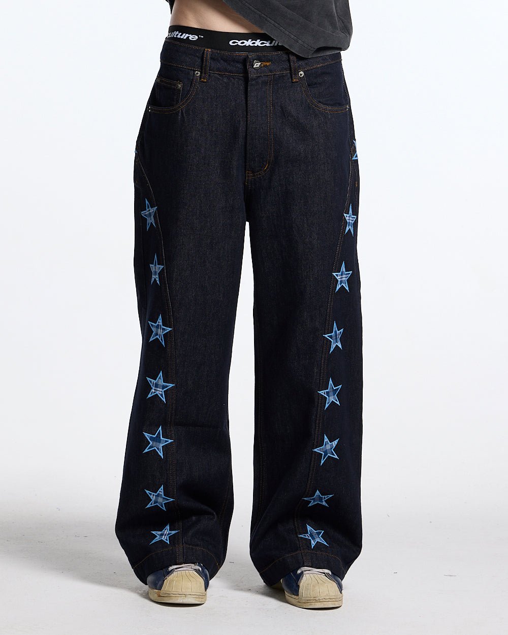 STARSHIP V3 PANTS RAW DENIM - raw denim pants with star print, front view on male model - Cold Culture