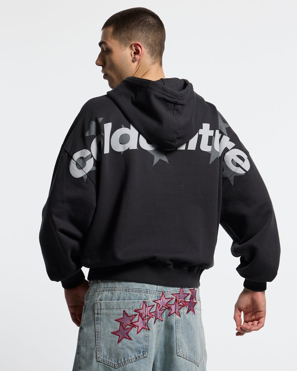 STELLAR HOODIE BLACK - black oversized hoodie, back view on male model - Cold Culture #man