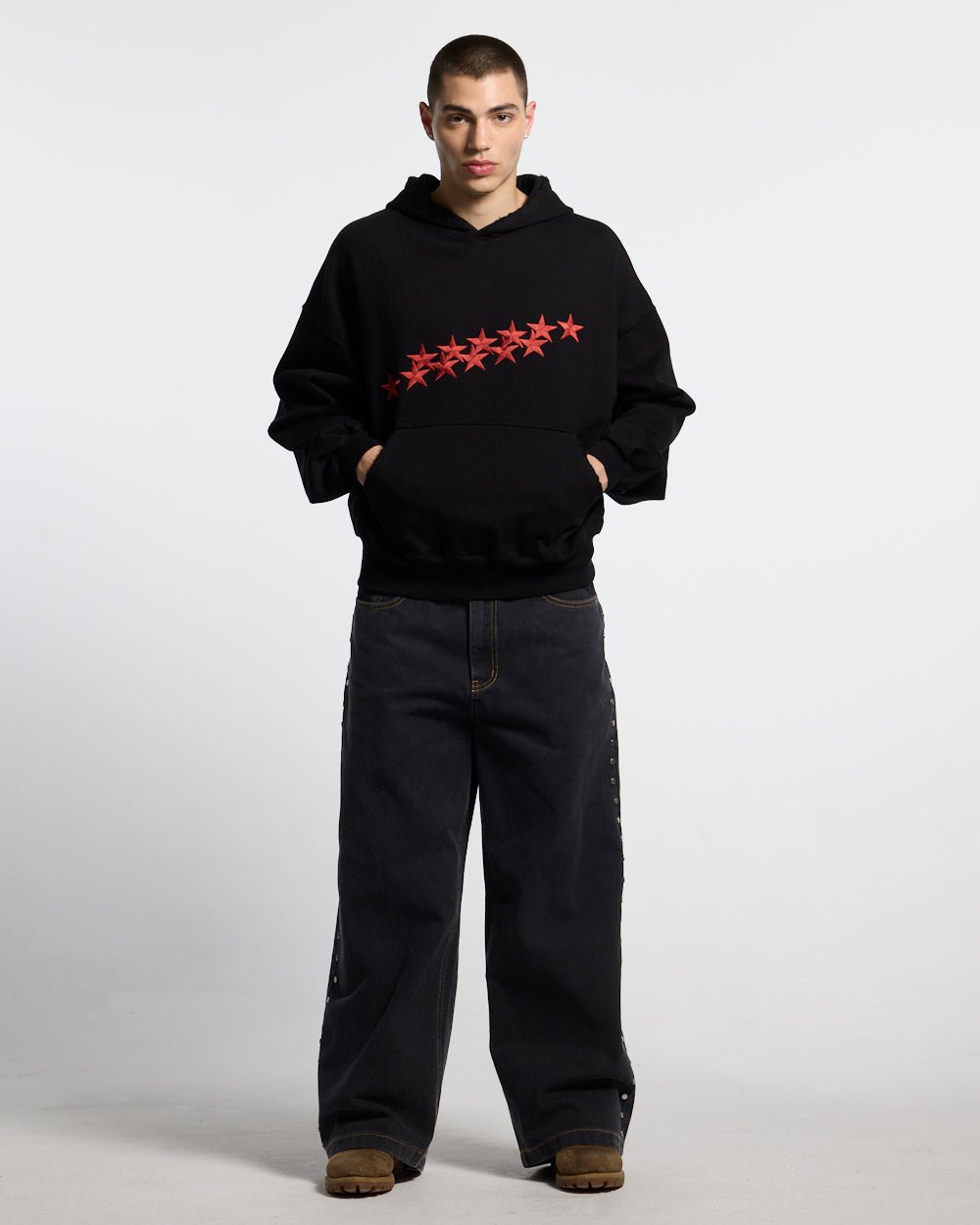 STUDS PANTS BLACK DENIM - black studded denim pants, front view on male model - Cold Culture #man