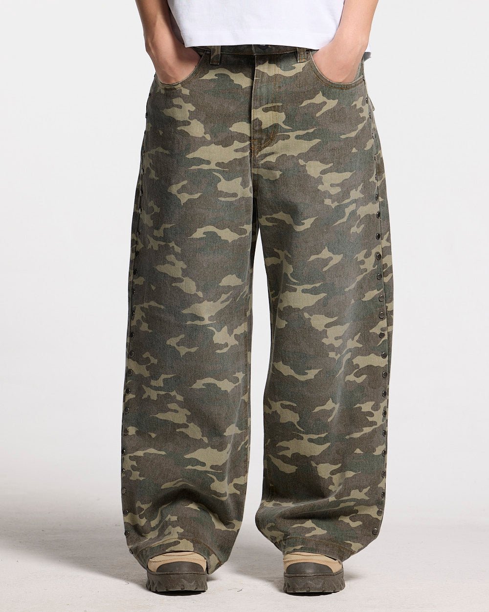STUDS PANTS CAMO - camo studded pants, front view on female model - Cold Culture #woman
