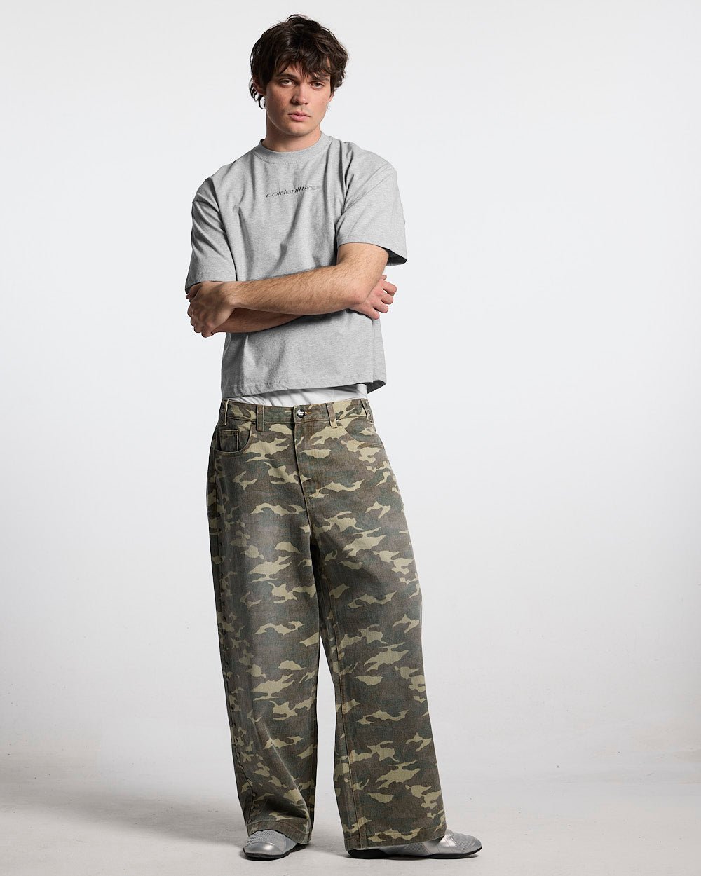 STUDS PANTS CAMO - camo studded pants, front view on male model - Cold Culture #man