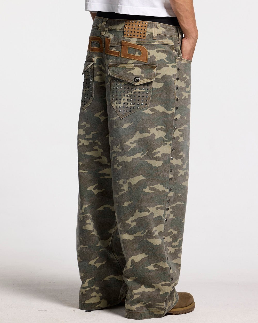 STUDS PANTS CAMO - camo studded pants, back view on male model - Cold Culture