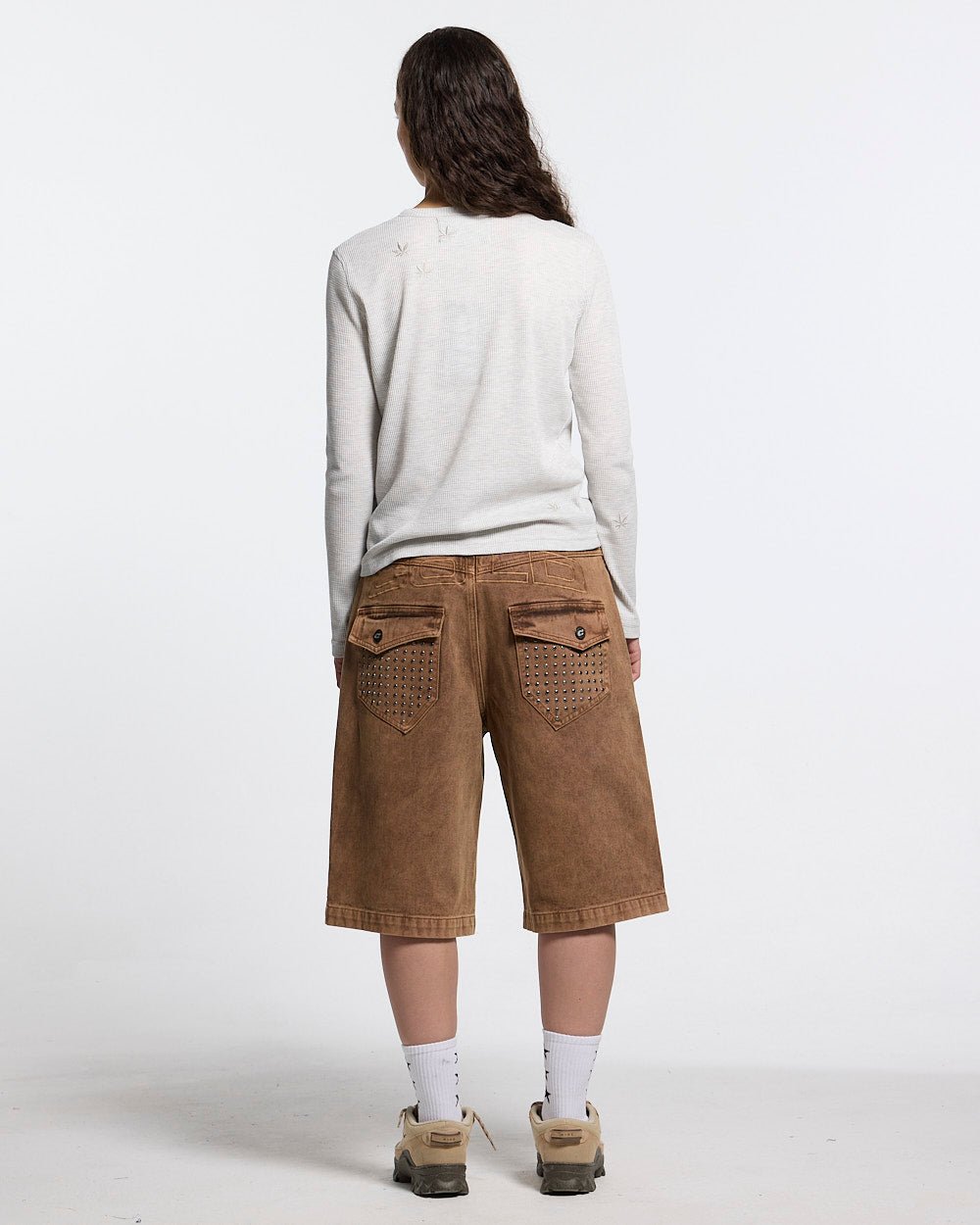 STUDS SHORT BROWN - brown studded denim shorts, back view on female model - Cold Culture #woman