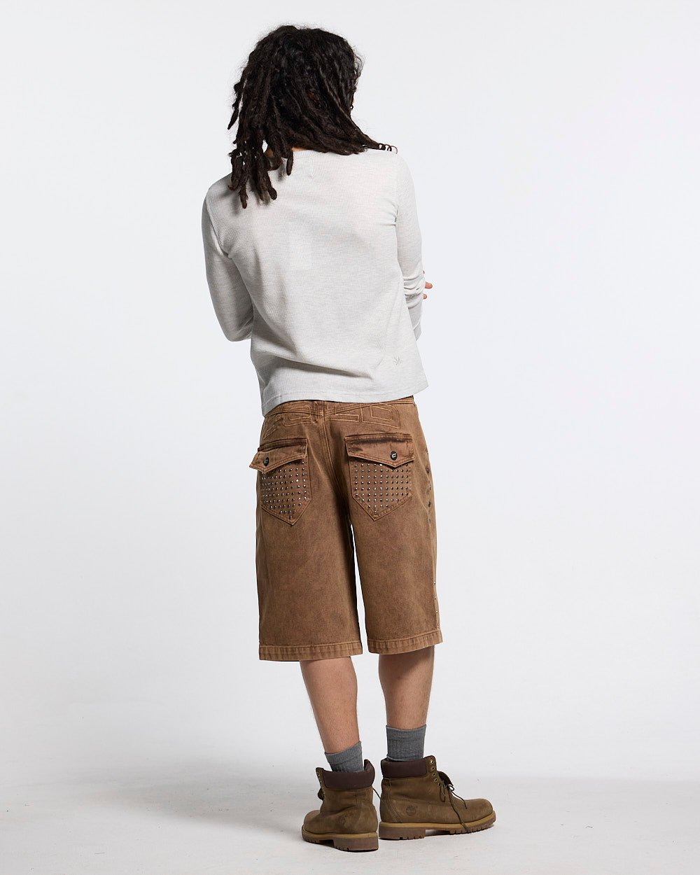 STUDS SHORT BROWN - brown studded denim shorts, back view on male model - Cold Culture #man