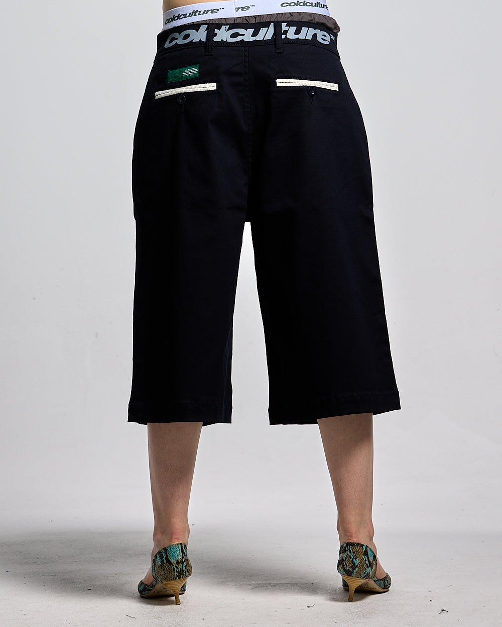 SUIT JORTS DARK BLUE - dark navy tailored shorts, back view on female model - Cold Culture #woman