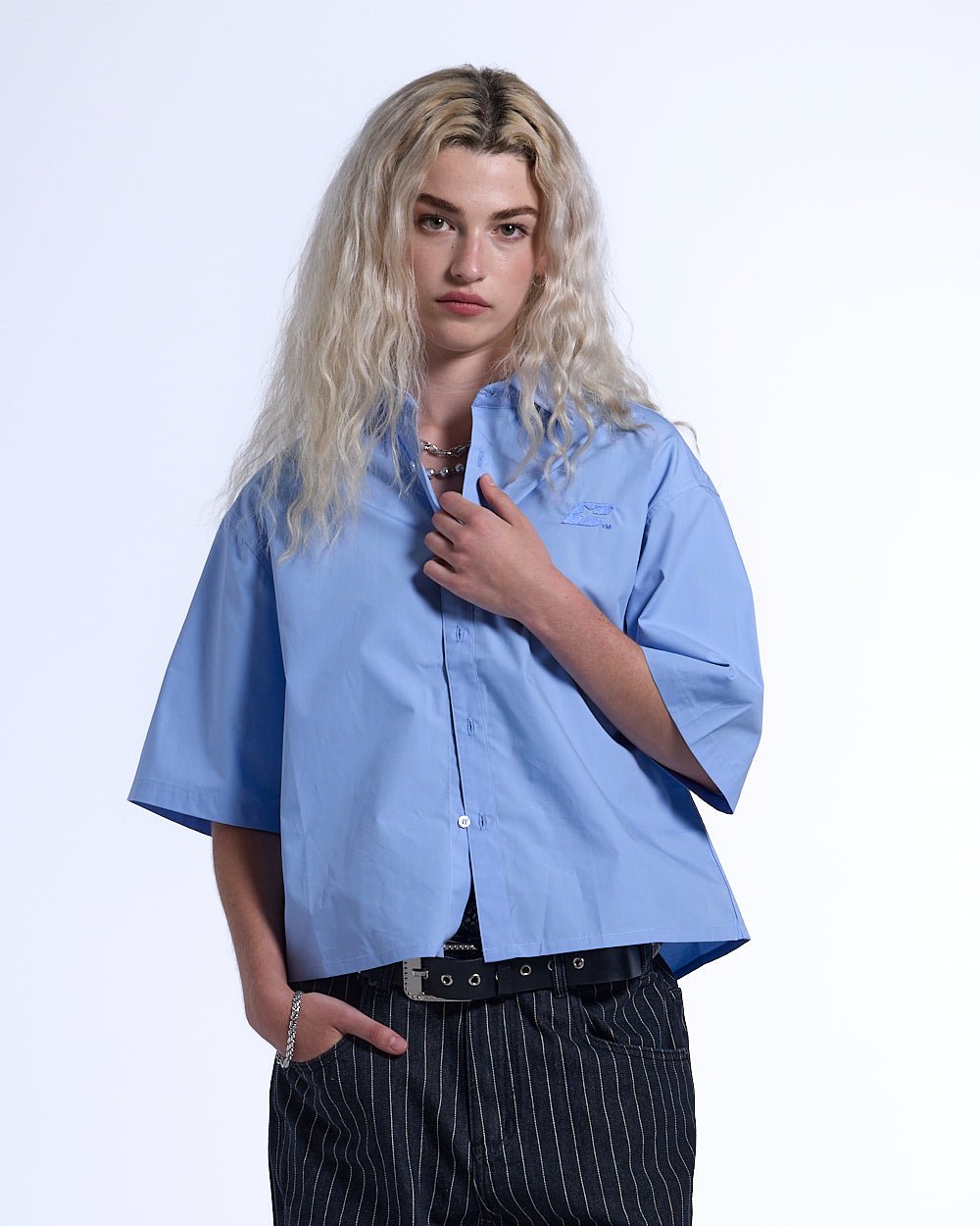 SWEDEN SHIRT BABY BLUE - baby blue short sleeve shirt, front view on female model - Cold Culture #woman