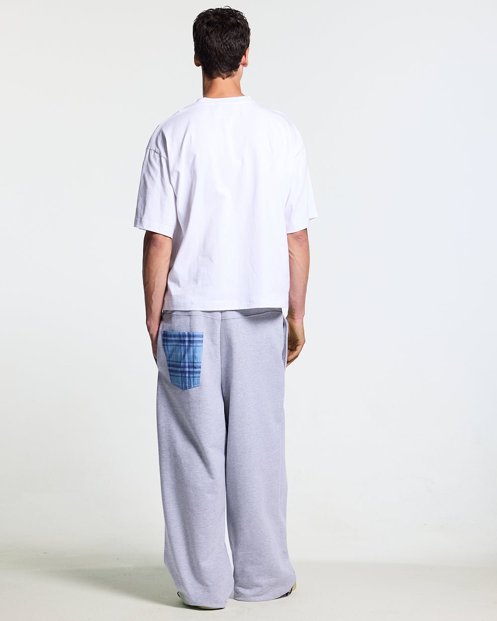 TAKE A PEAK SWEATPANTS HEATHER GREY - grey sweatpants with plaid trim, back view on male model - Cold Culture #man