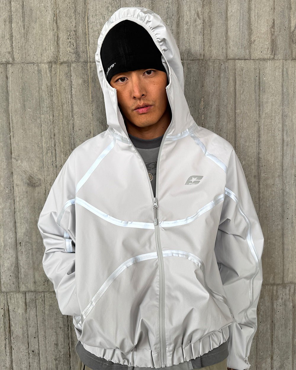 TAKE OFF LIGHTWEIGHT JACKET LIGHT GREY - light grey reflective trim jacket, front view on male model - Cold Culture