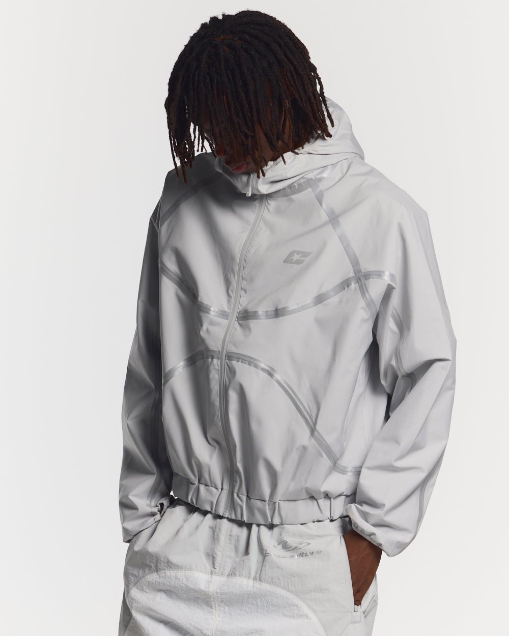 TAKE OFF LIGHTWEIGHT JACKET LIGHT GREY - light grey reflective trim jacket, front view on male model - Cold Culture #man