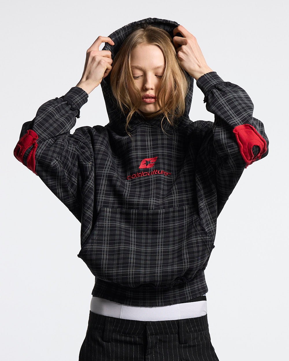 TARTAN HOODIE BLACK, GREY & RED - black and grey tartan hoodie, front view on female model - Cold Culture #woman
