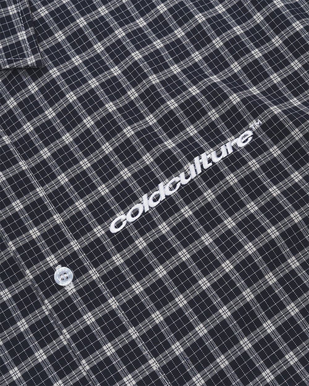 TARTAN SCRIPT SHIRT BLACK - black plaid short sleeve shirt, detail close-up - Cold Culture