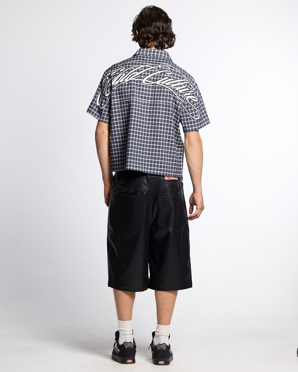 TARTAN SCRIPT SHIRT BLACK - black plaid short sleeve shirt, back view on male model - Cold Culture #man