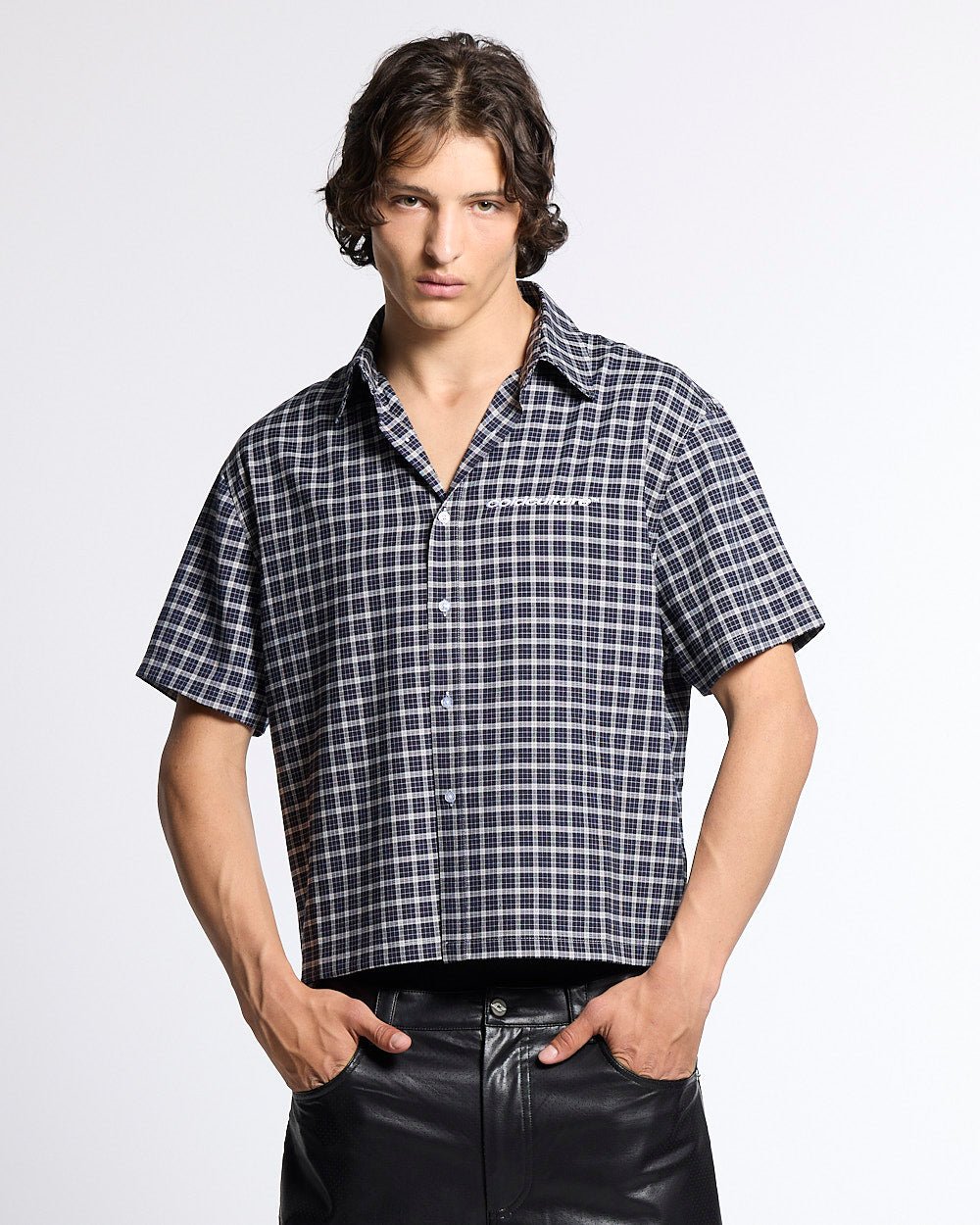 TARTAN SCRIPT SHIRT BLACK - black plaid short sleeve shirt, front view on male model - Cold Culture #man