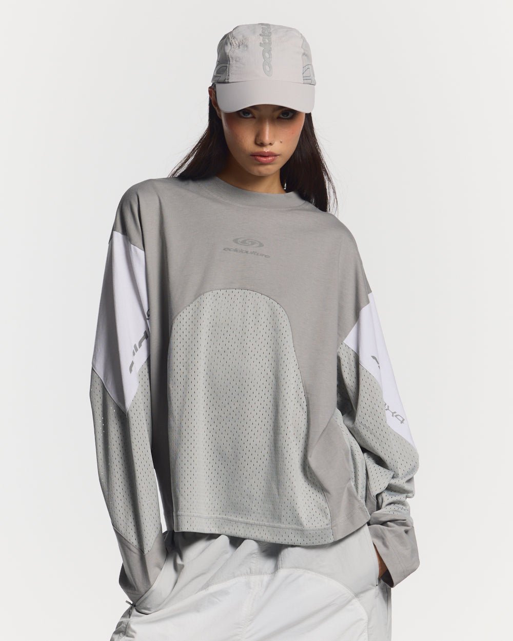 THUNDER LONGSLEEVE LIGHT GREY - light grey paneled longsleeve tee, front view on female model - Cold Culture #woman