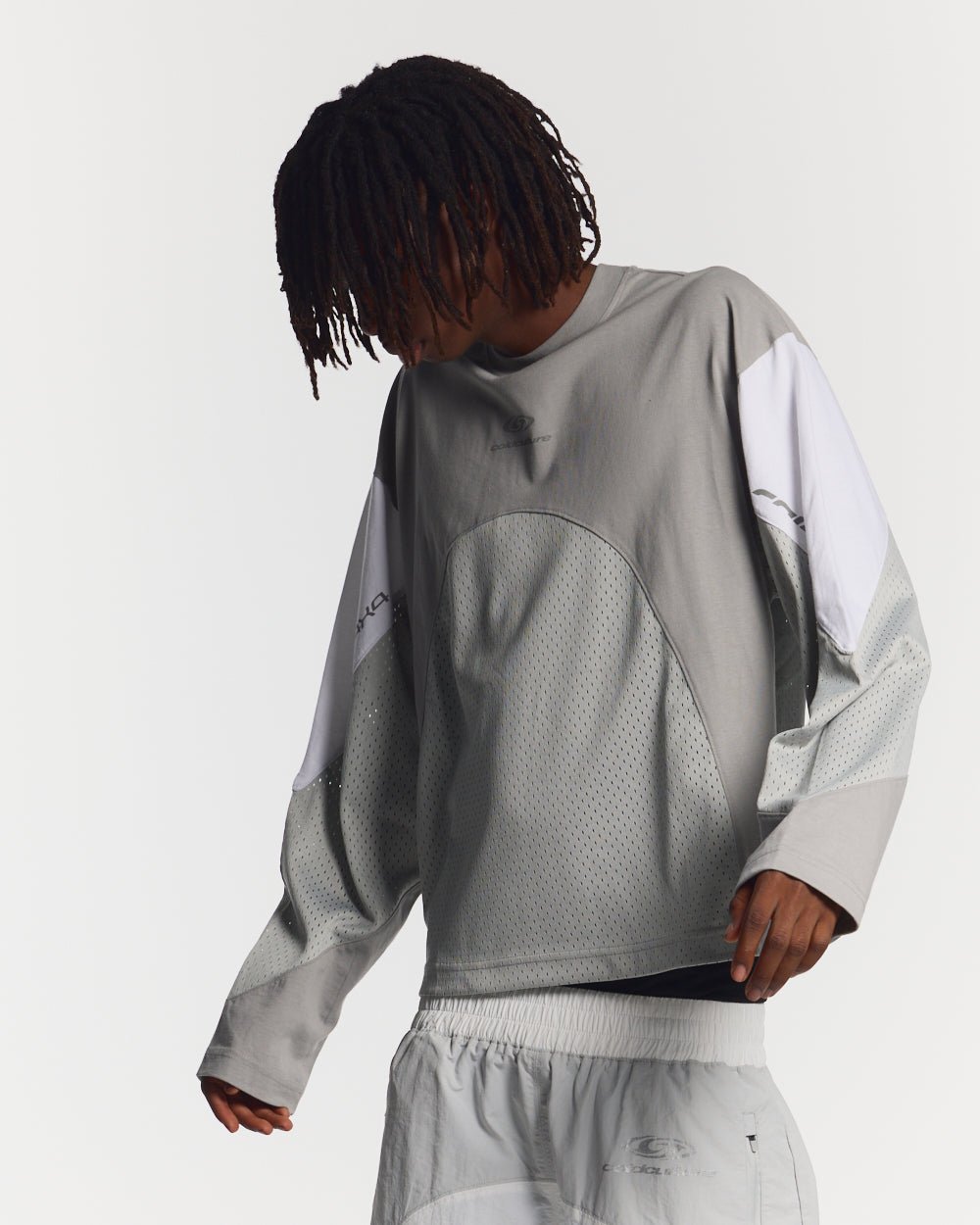 THUNDER LONGSLEEVE LIGHT GREY - light grey paneled longsleeve tee, front view on male model - Cold Culture #man