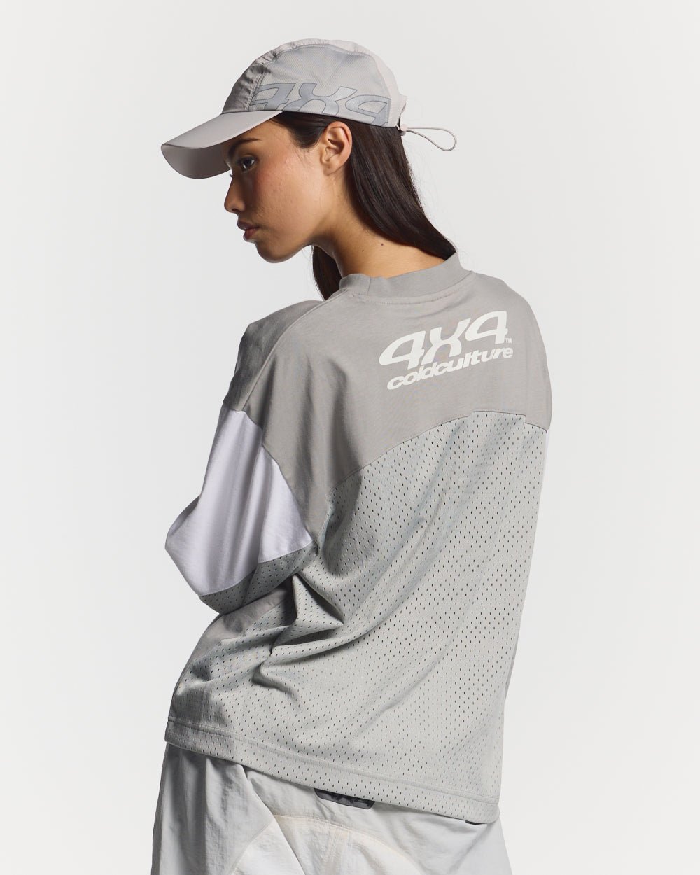 THUNDER LONGSLEEVE LIGHT GREY - light grey paneled longsleeve tee, back view on female model - Cold Culture #woman