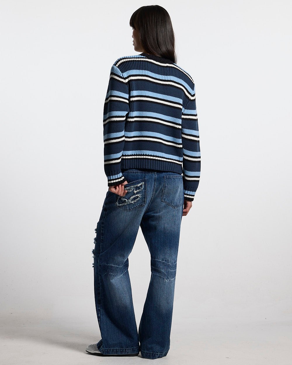 TIMELESS KNITWEAR BLUE - blue striped knit sweater, back view on female model - Cold Culture #woman