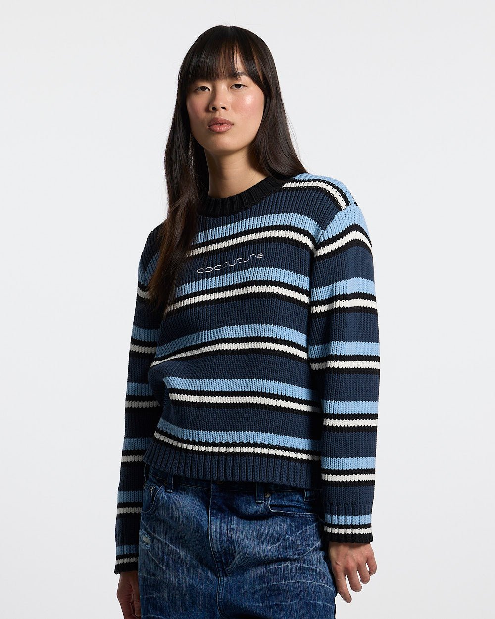 TIMELESS KNITWEAR BLUE - blue striped knit sweater, front view on female model - Cold Culture #woman