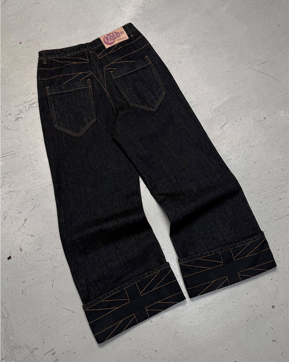 TOP BOY PANTS BLACK DENIM - black denim baggy pants, flat lay - Cold Culture