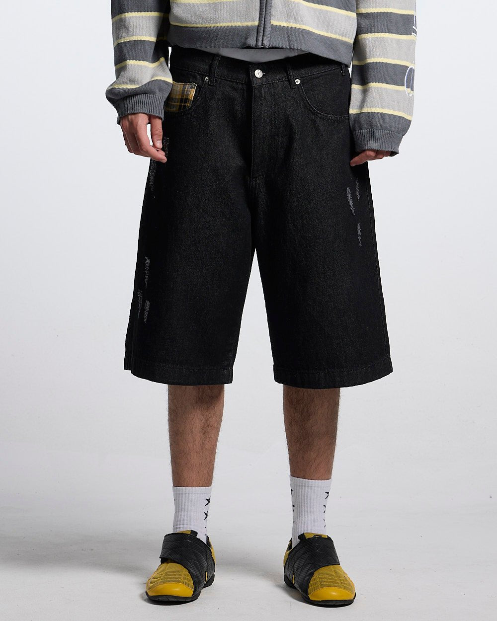 TOXIC SHORTS BLACK DENIM - black distressed denim shorts, front view on male model - Cold Culture