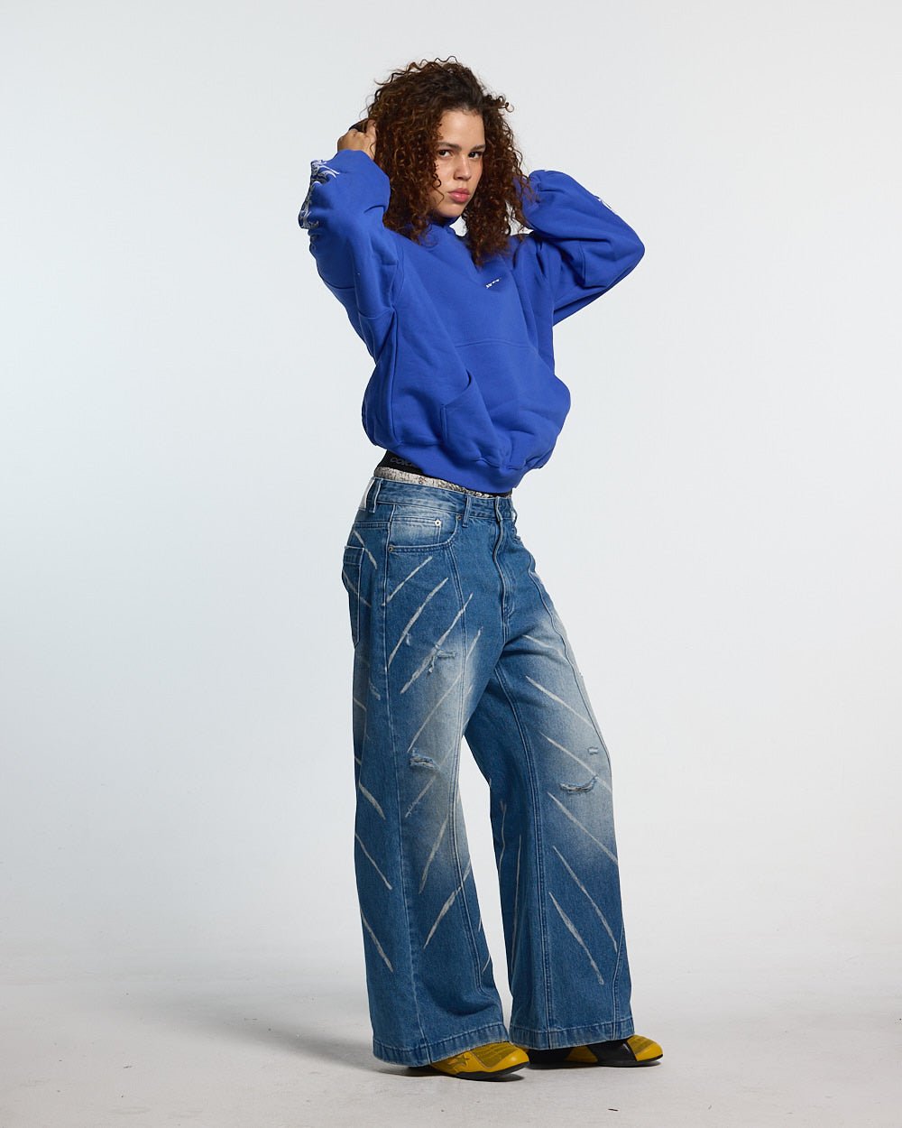 TRIBAL HOODIE BLUE - blue tribal print hoodie, front view on female model - Cold Culture #woman