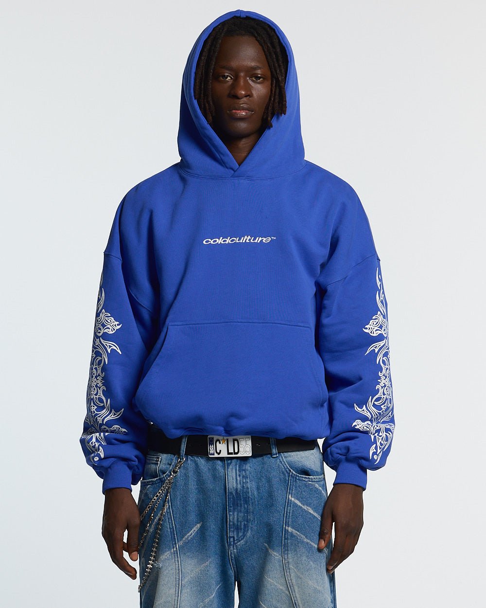 TRIBAL HOODIE BLUE - blue tribal print hoodie, front view on male model - Cold Culture #man
