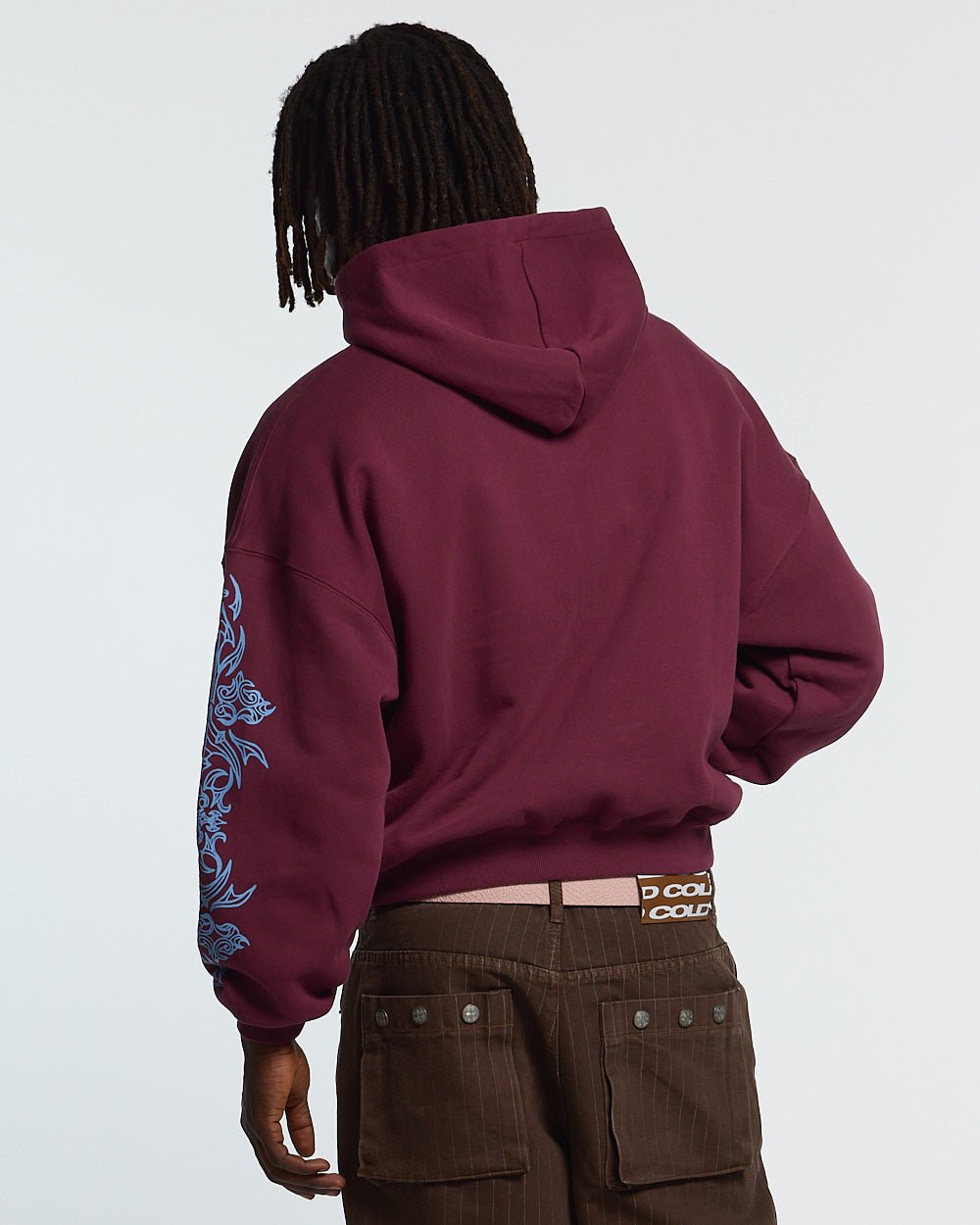 TRIBAL HOODIE BURGUNDY - burgundy tribal print hoodie, back view on male model - Cold Culture #man