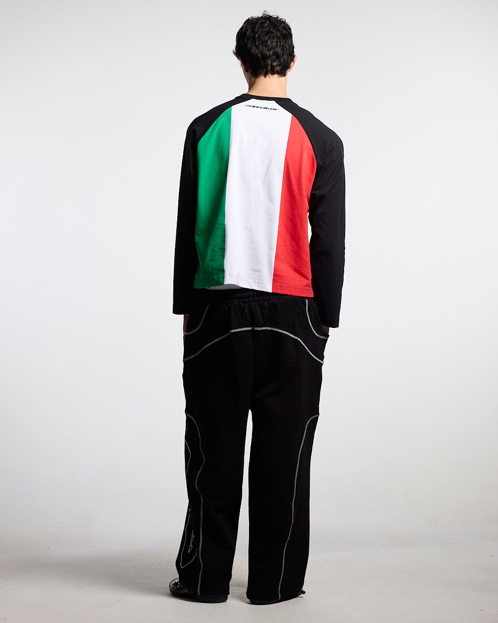 TRICOLORE LONGSLEEVE BLACK - black football-style longsleeve tee, back view on male model - Cold Culture #man