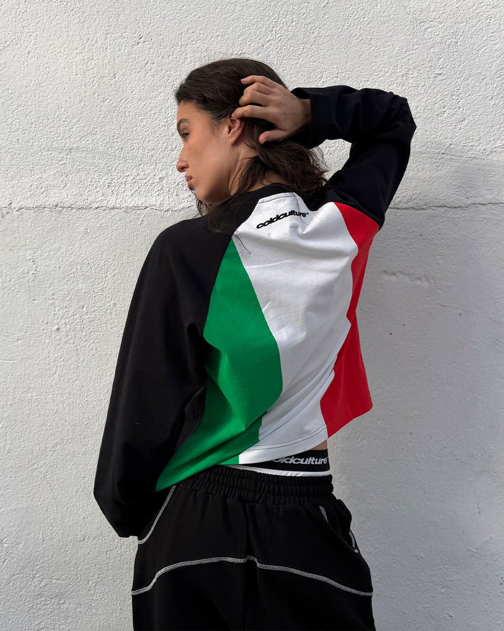 TRICOLORE LONGSLEEVE BLACK - black football-style longsleeve tee, street style shot - Cold Culture #woman
