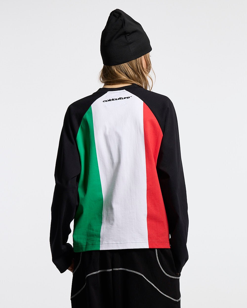TRICOLORE LONGSLEEVE BLACK - black football-style longsleeve tee, back view on female model - Cold Culture #woman