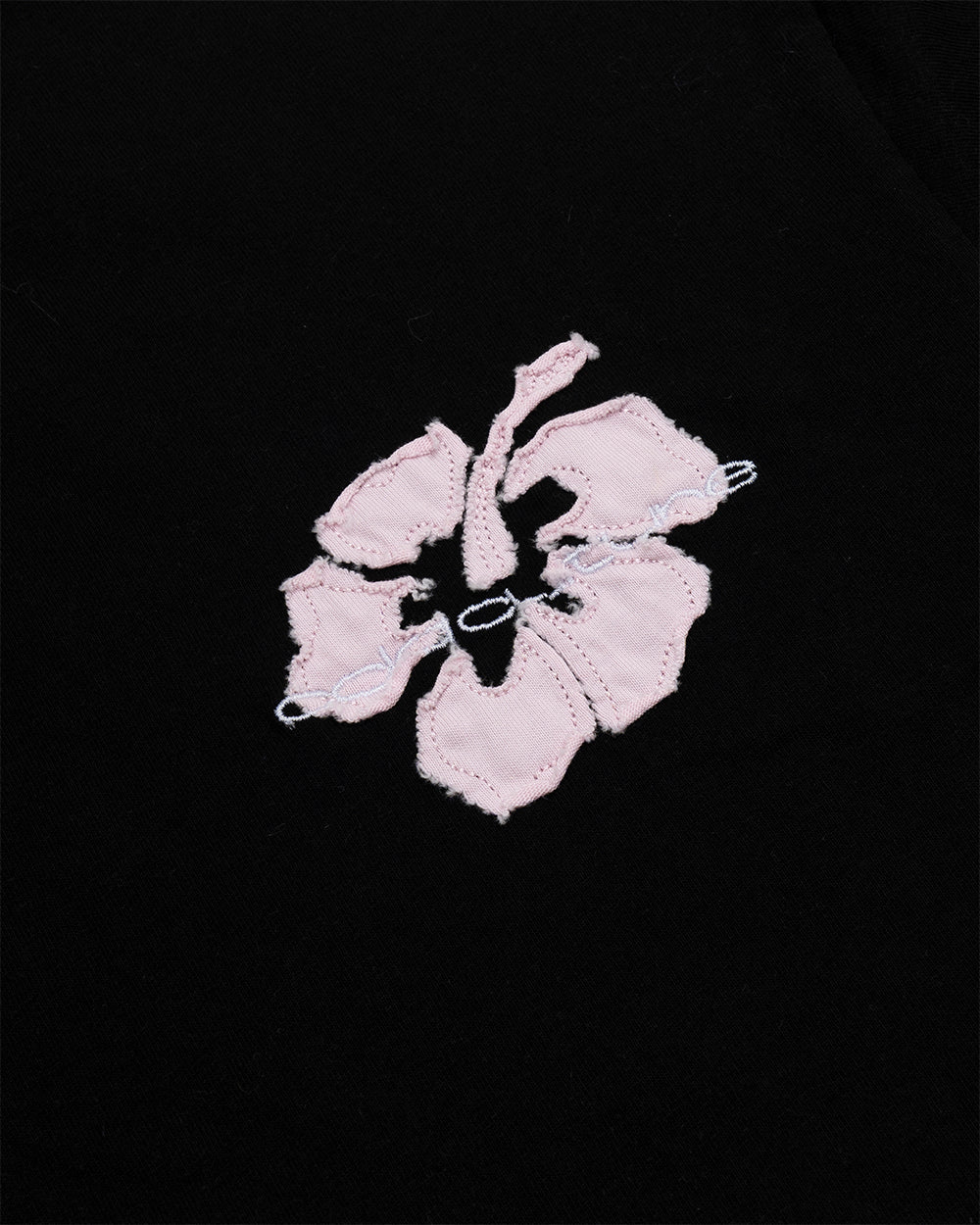 TROPICAL FEVER TEE BLACK - black hibiscus print tee, detail close-up - Cold Culture
