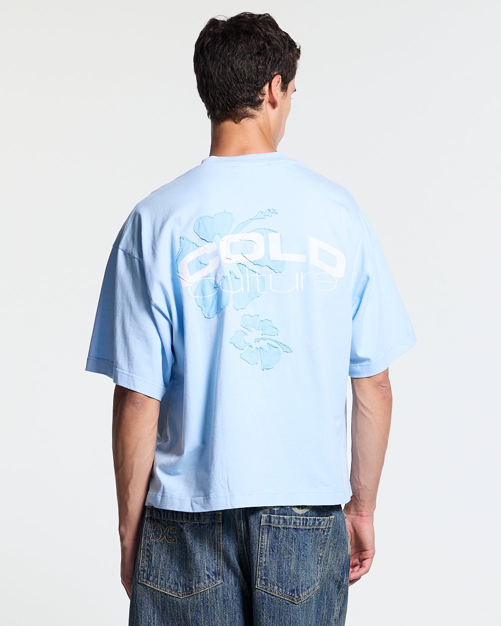 TROPICAL FEVER TEE BLUE - light blue floral print tee, back view on male model - Cold Culture #man